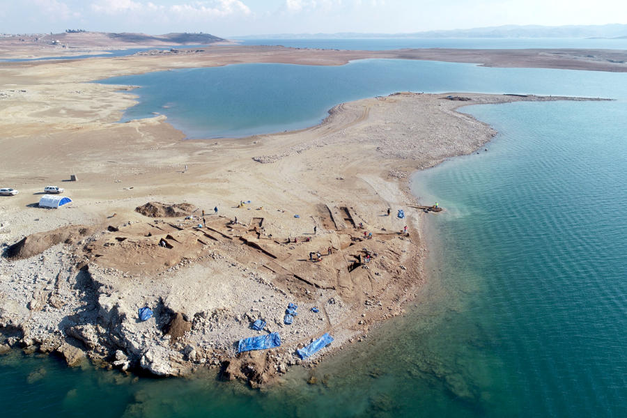 Aerial view of the excavations at Kemune with Bronze Age architecture partly submerged in the lake