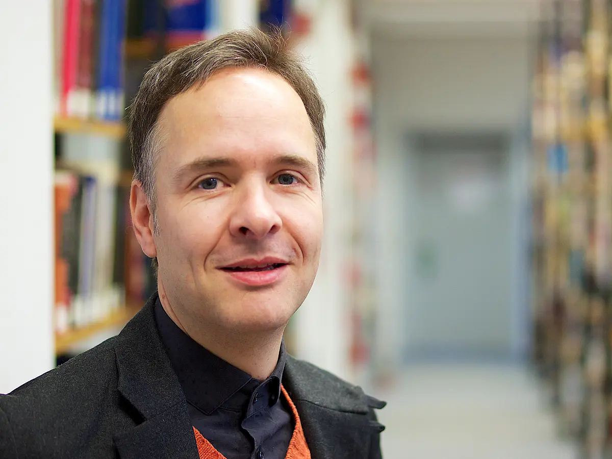 Das Bild zeigt Jan Eckel, Direktor des Seminars für Zeitgeschichte