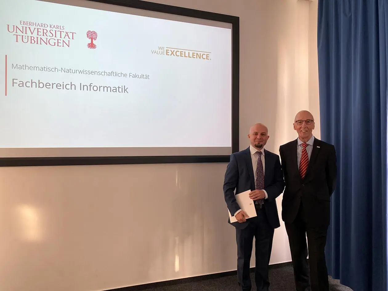 Prof. Dr. Gjergji Kasneci und Prof. Dr. Wolfgang Rosenstiel bei der Verleihung der Ehrenprofessur