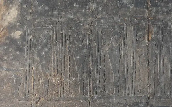 A ceiling covered in thousands of years’ worth of dust and soot.