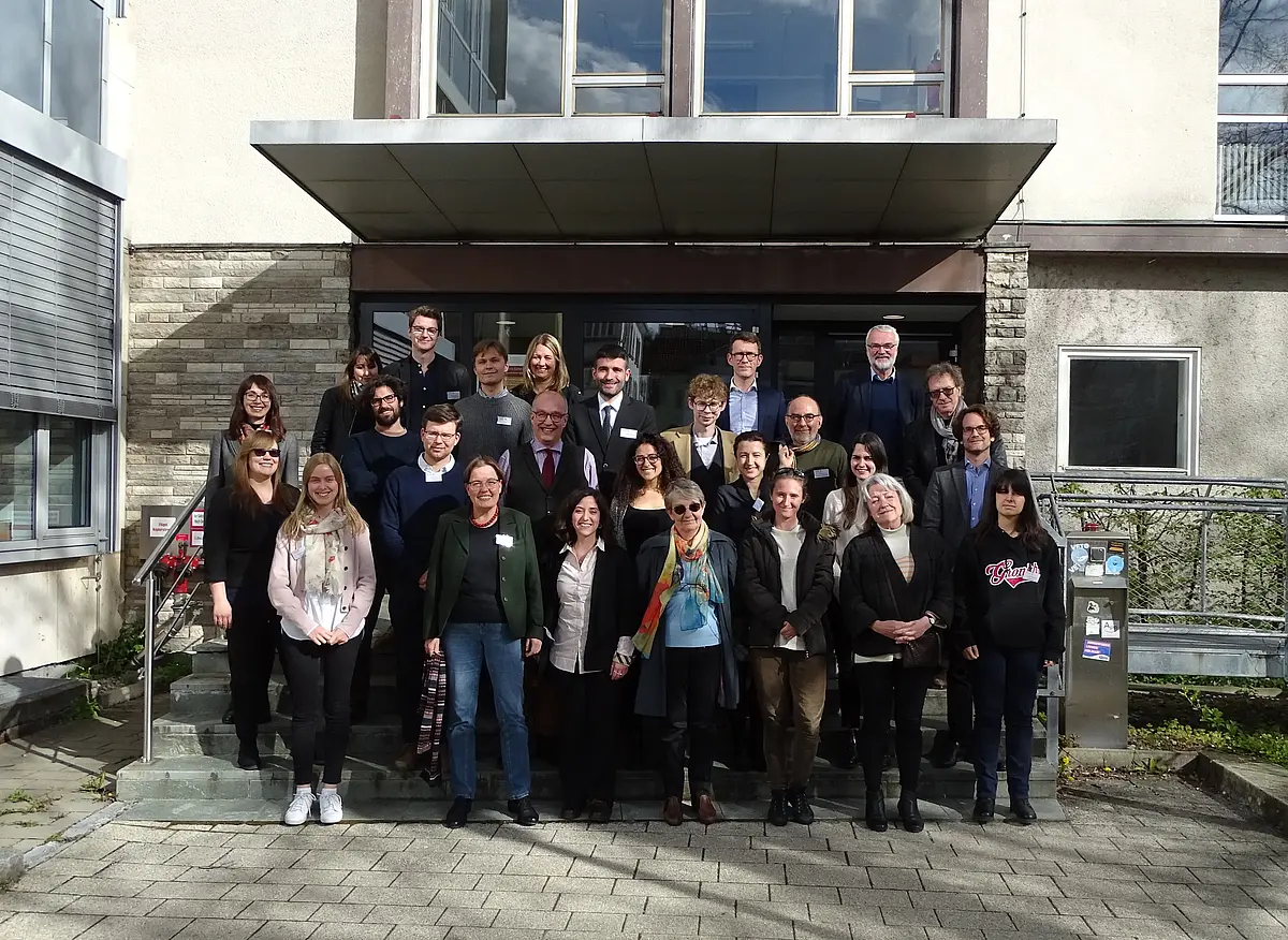 The Fotograph shows the group of speakers and some of the guest at the Conference "The Wrong Direction" in Tübingen in front of the Hegelbau in spring 2023.