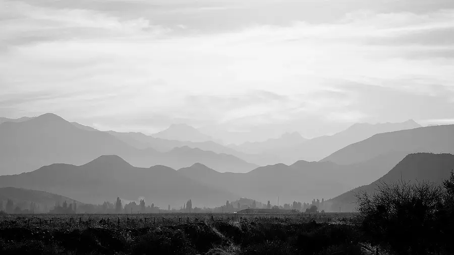 The Chilean coastal cordillera and the Andes in the background near Santiago de Chile.