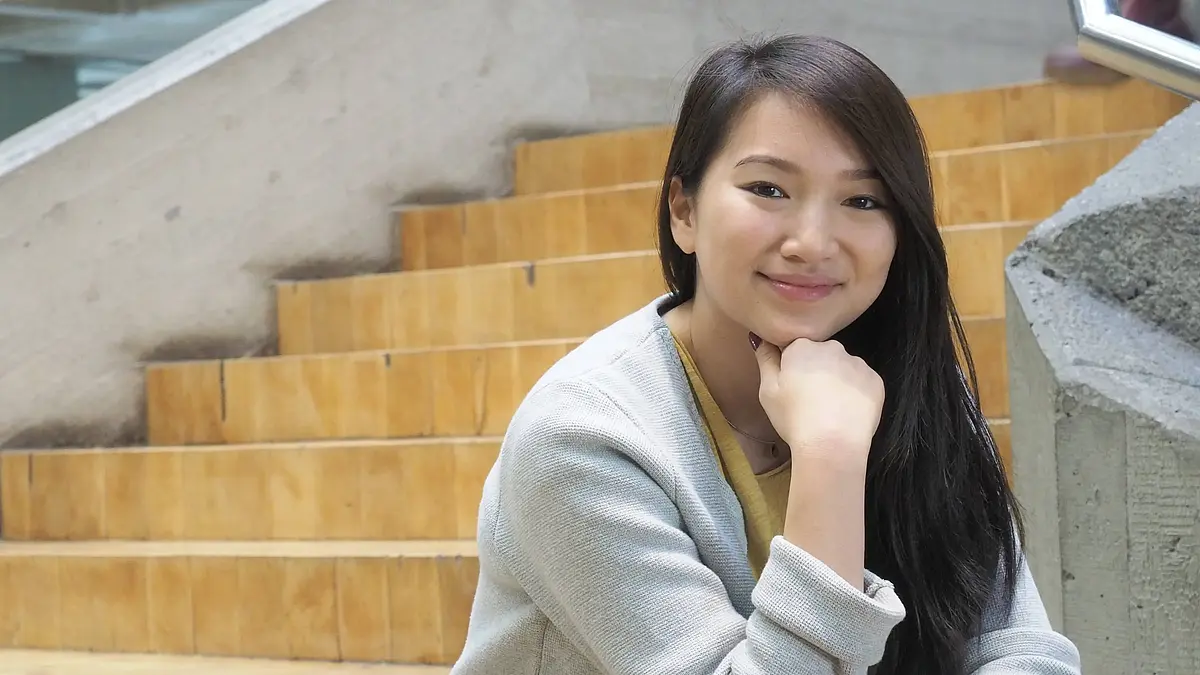 Student sitting on stairs