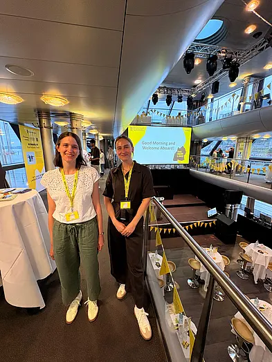 Theresa und Lisa at the Exhibition Booth