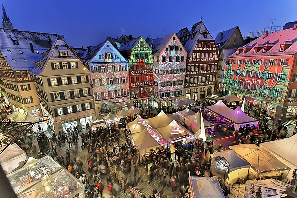 ChocolART Festival on Tübingens market square with light projections on the buildings.