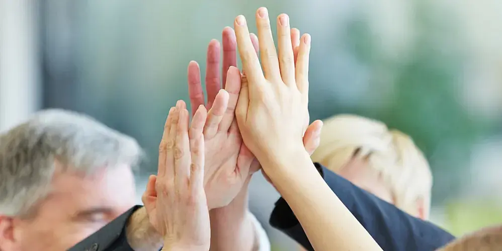 Hände beim High five