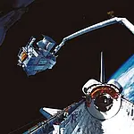 Das Tübinger ASTRO-SPAS am Shuttle-Arm während des Heraushebens aus der Shuttle-Ladebucht Institut für Astronomie und Astrophysik. Foto: © DLR/NASA