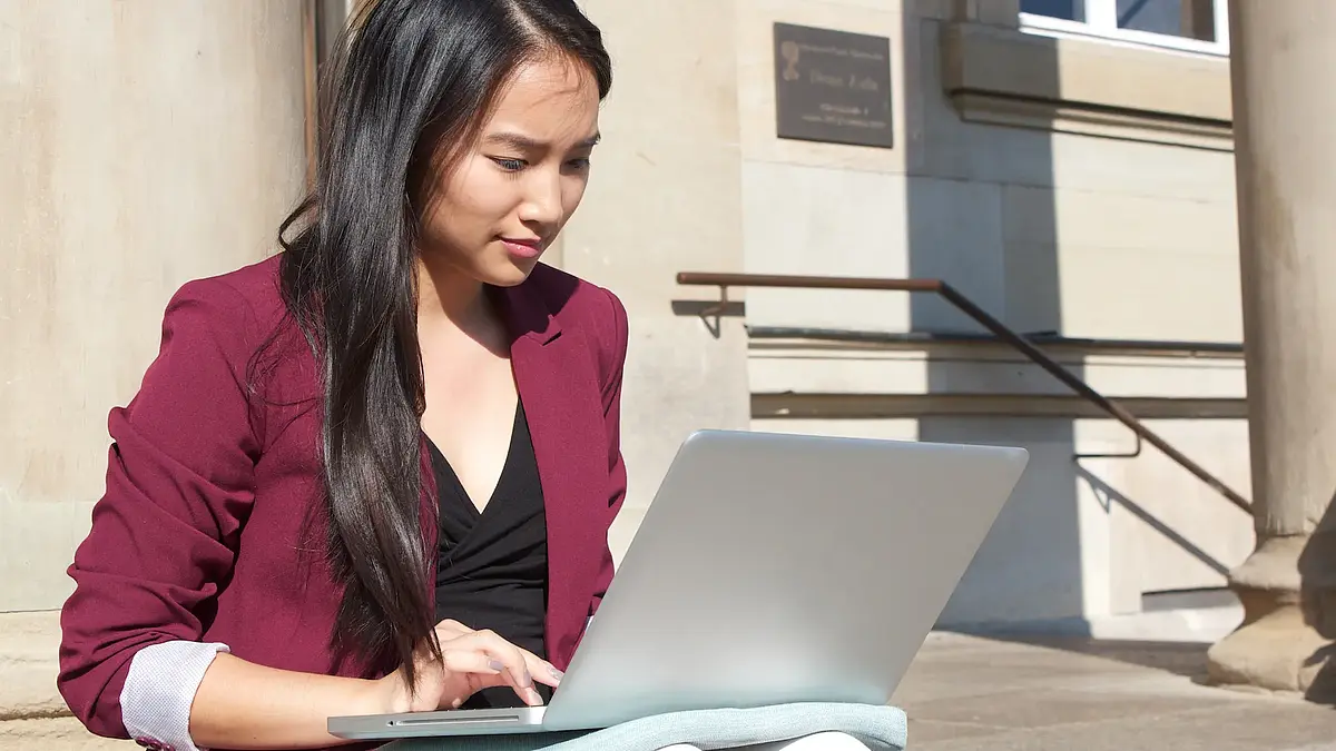 Student working on a laptop