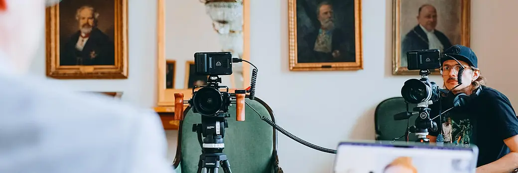 A content creator using a video camera