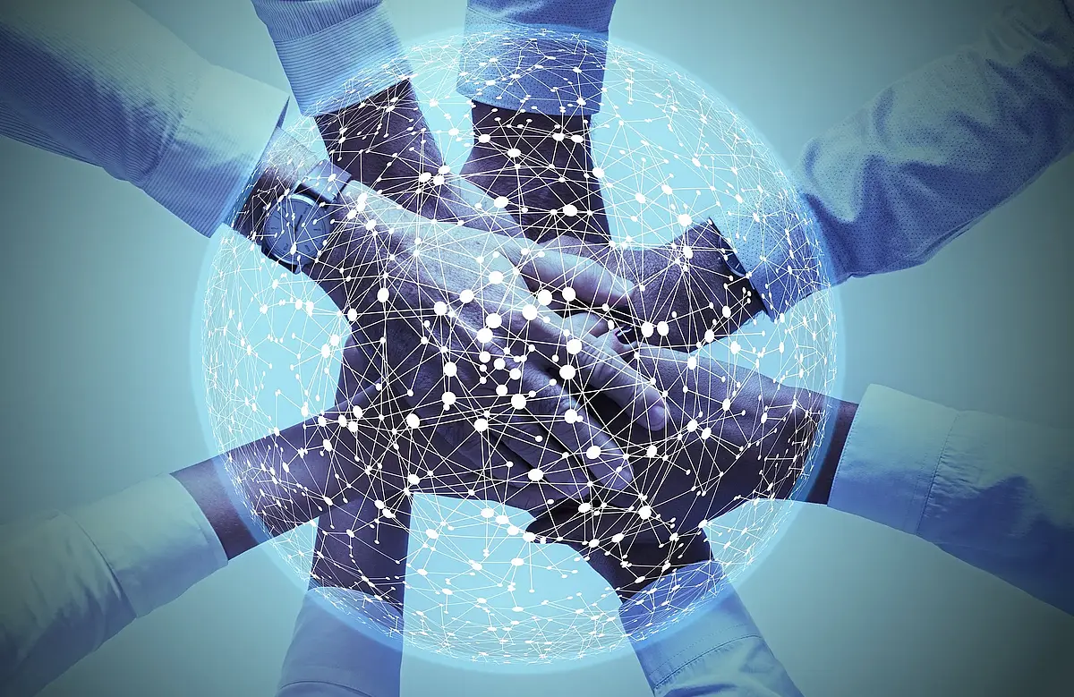 Eight arms with handshake