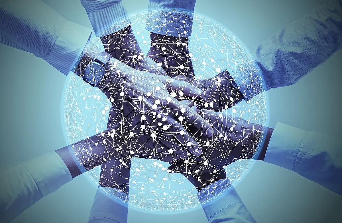 Eight arms with handshake