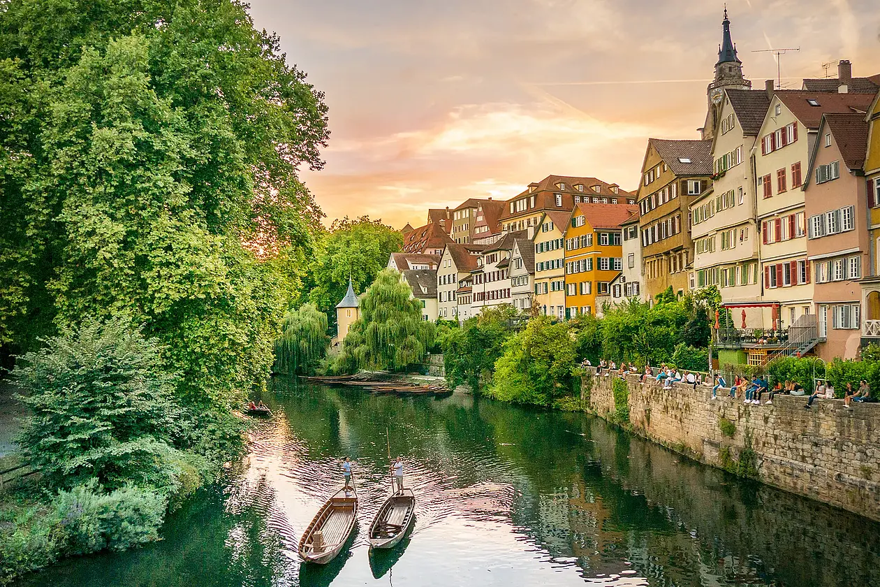 View of the Tübingen Neckarfront with colorful historic houses lining the riverbank of the Neckar River.