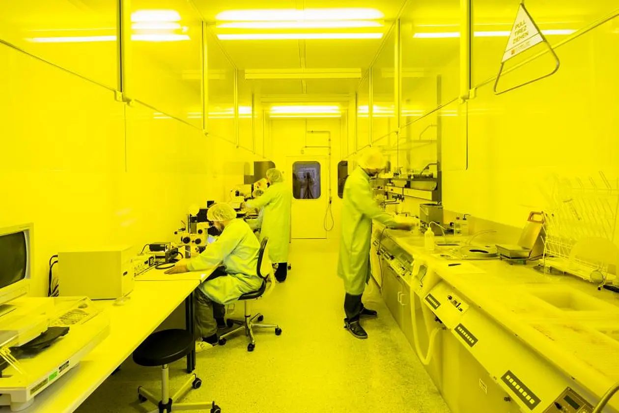 Scientists working in LISA+’s yellow room.
