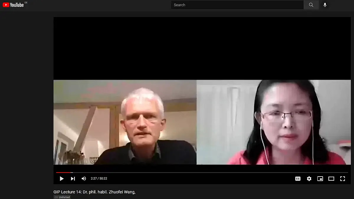 A gentleman on the left and a lady on the right communicating with each other online