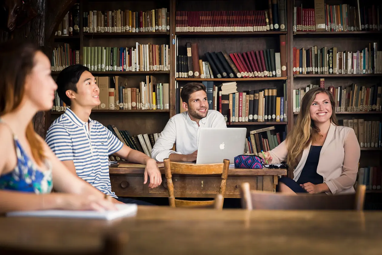 Students sitting in a library