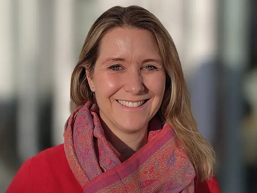 Headshot of Melanie Nagel smiling into the camera.