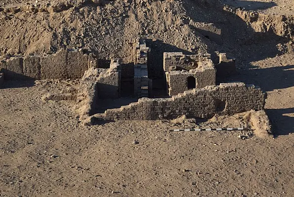 Photo of a building complex ruin with stairs and vaults after removal of several layers