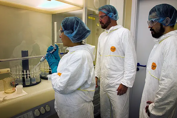 Scientists carrying out an experiment in the laboratory