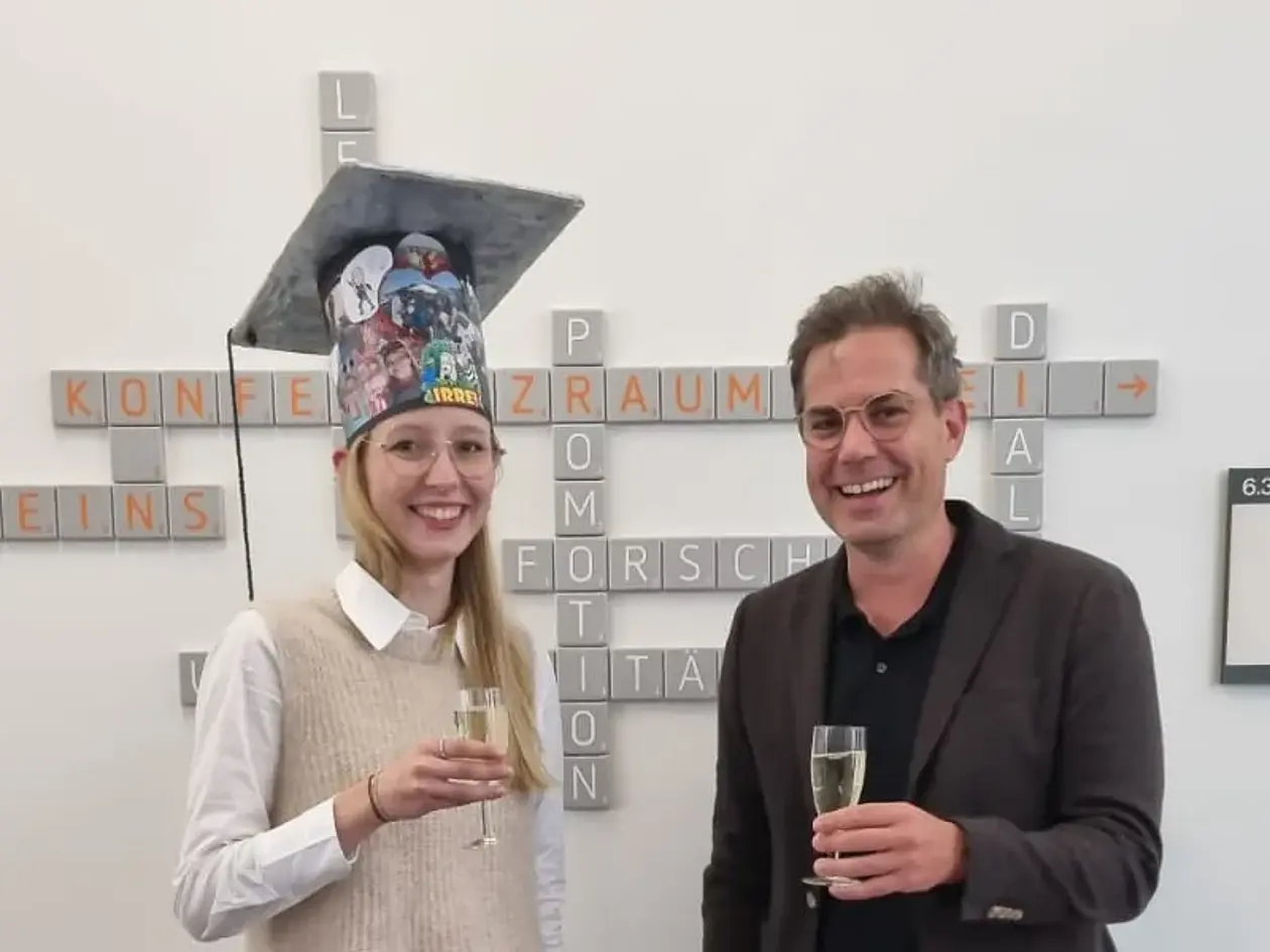 Celebration of a successful dissertation defense within the LEAD Graduate School & Research Network.