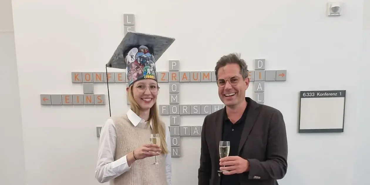 Celebration of a successful dissertation defense within the LEAD Graduate School & Research Network.