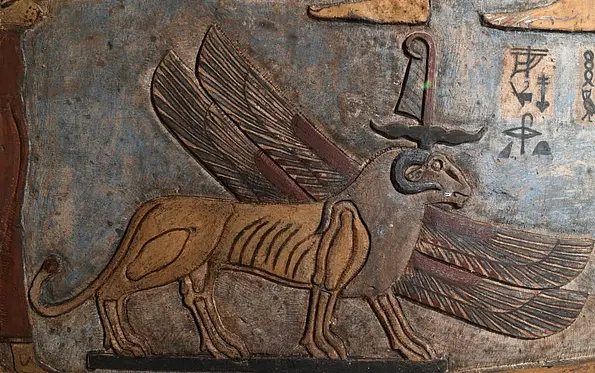Representation of the south wind as a lion with four wings and a ram's head.