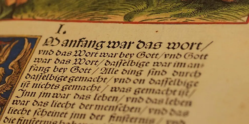 Abbildung der ersten Verse aus dem Johannesevangelium.