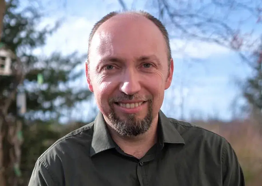 Das Porträt zeigt Dr. Volker Lang