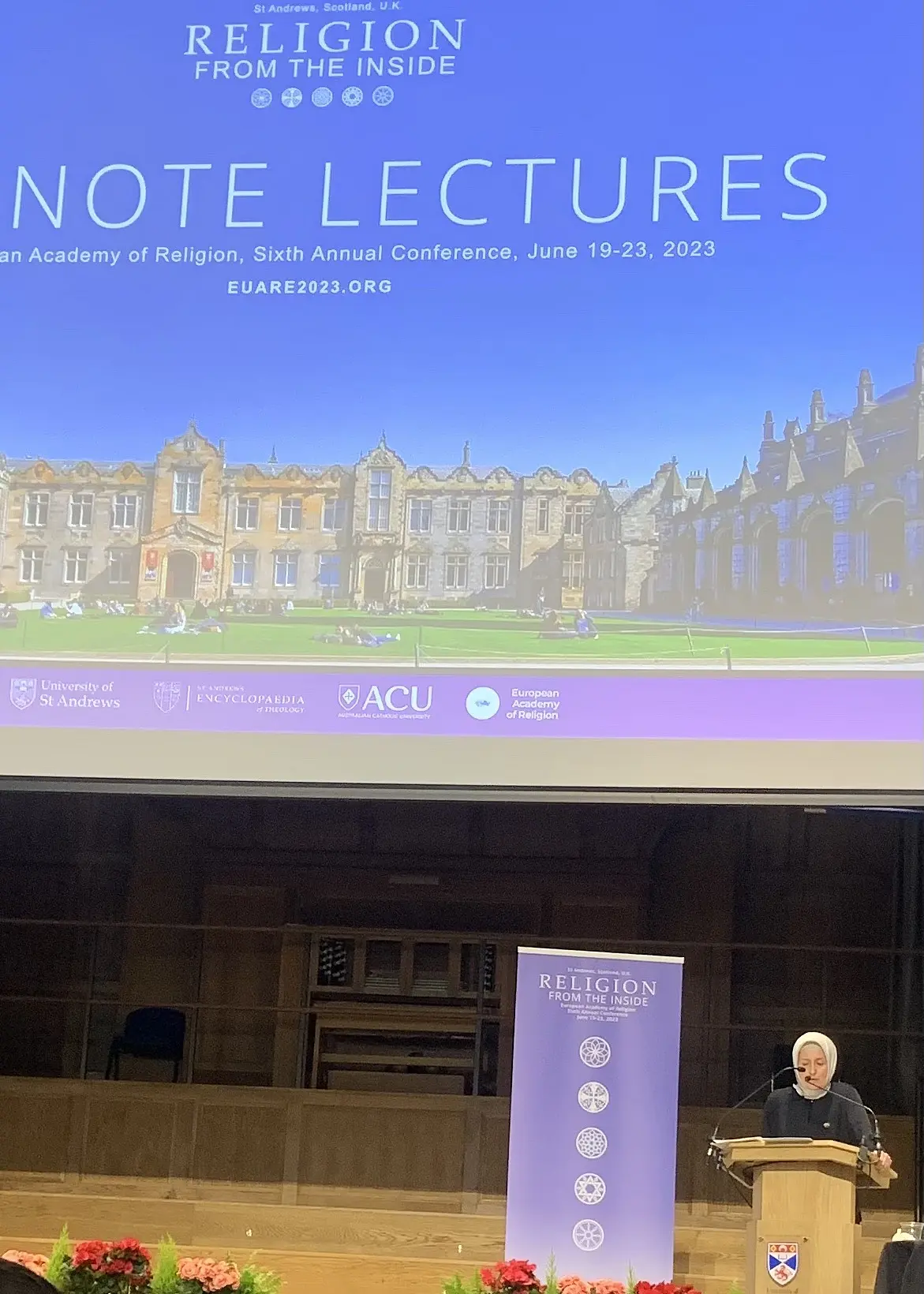 Scholar giving a speech