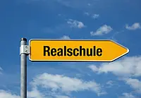 Direction sign with the title Realschule