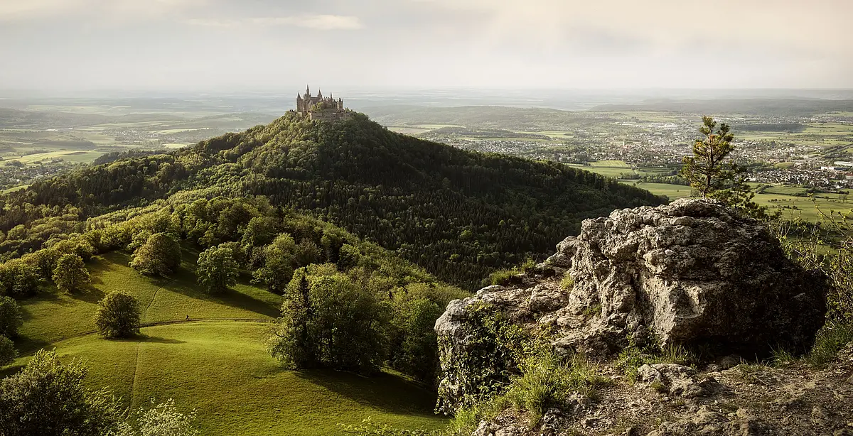 View of Hohenzollern Castle in a green landscape of the Zeller Horn