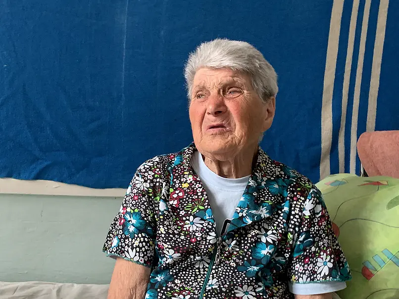 Eine verzweifelte Frau in Cherson. Durch die Überschwemmungen im Juni hat sie alles verloren.