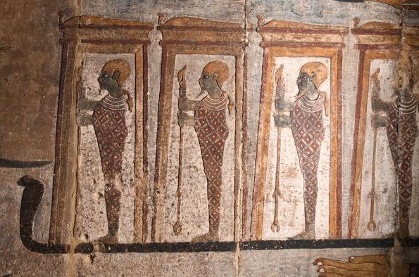 One of the representations with a parallel in the tomb of Iufaa in Abusir south of Cairo. Figures of the god Ptah in a shrine, standing on a long outstretched serpent.