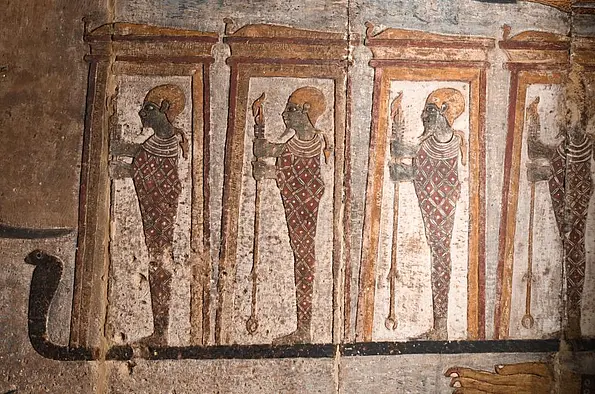 One of the representations with a parallel in the tomb of Iufaa in Abusir south of Cairo. Figures of the god Ptah in a shrine, standing on a long outstretched serpent.