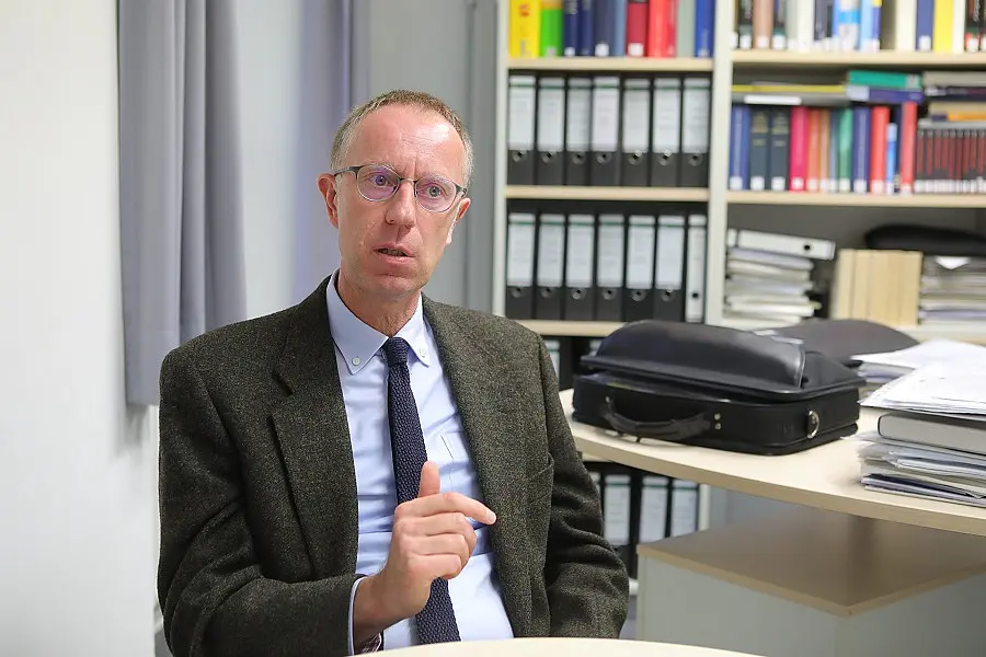 Photo of Prof. Franz-Josef Bormann in his bureau