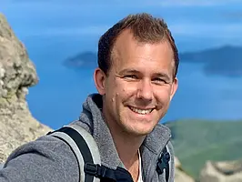 Das Bild zeigt Dr. Markus Maisch, der in die Kamera lächelt.