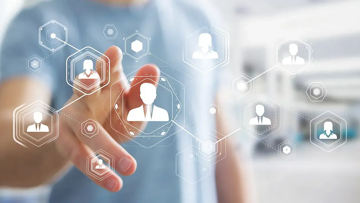 Person reaching out for a symbolic network structure