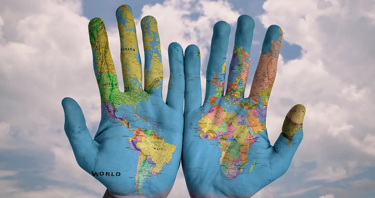 World map on hands deco image