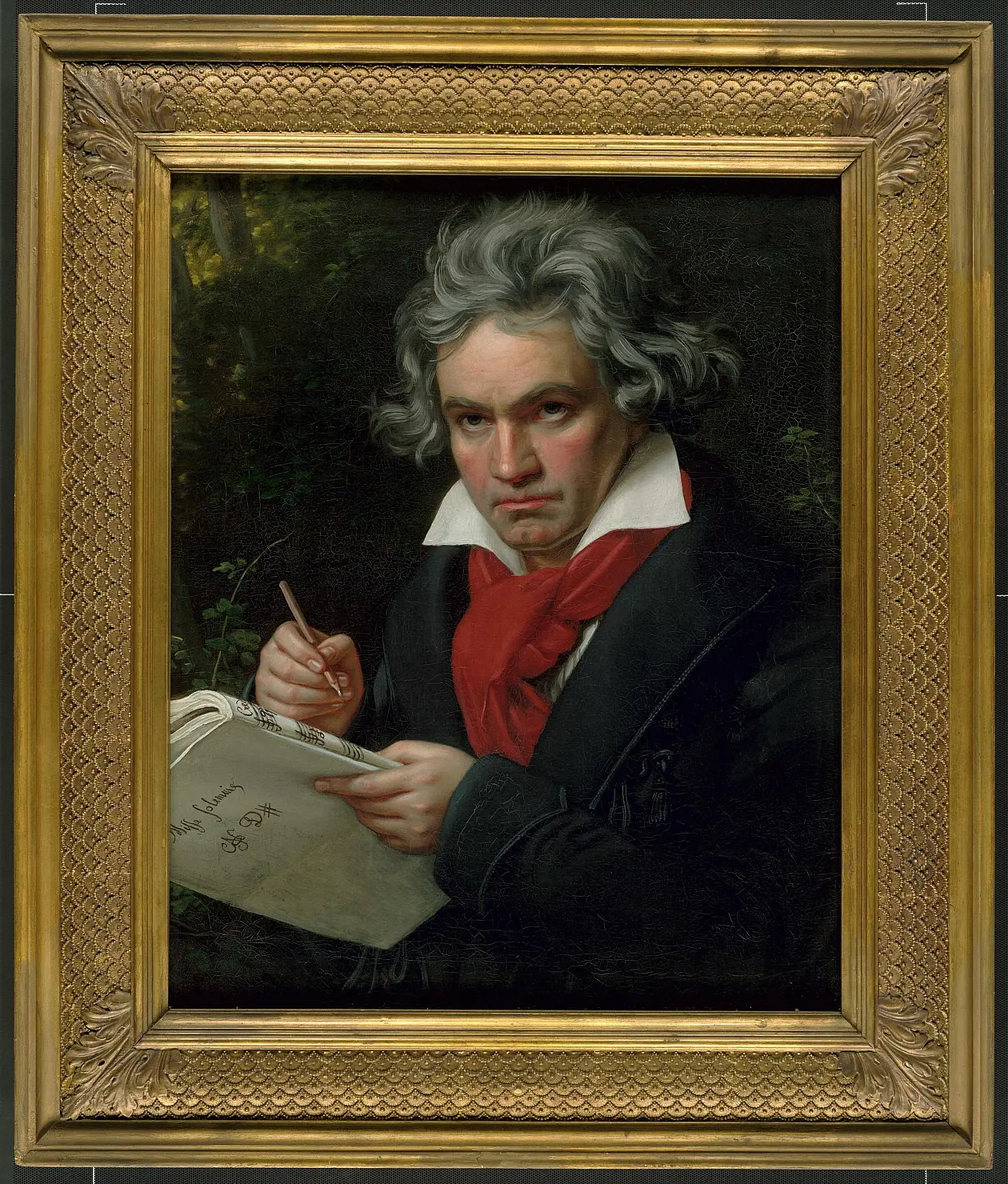 Portrait von Beethoven mit Notenheft in goldenem Rahmen