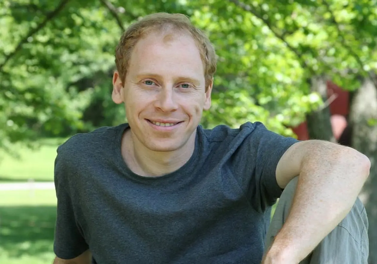 Anton Sirota smiles into the camera