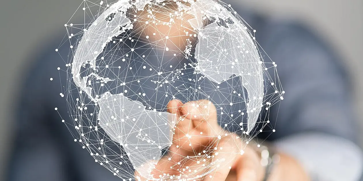 Symbolbild: Internationalisierung - Globus mit Netz