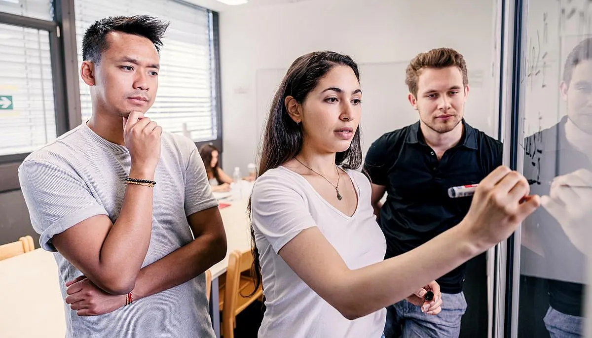 Students collaborate in solving a complex science problem