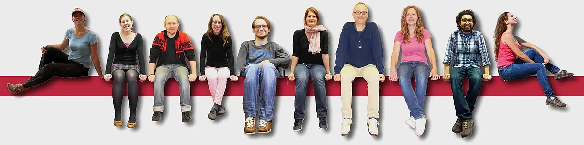 The team of Retinal Curcuits and Optogenetics sits on a bench