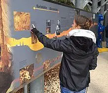 The display board in front of the Karlshöhle and Bärenhöhle near the town of Sonnenbühl