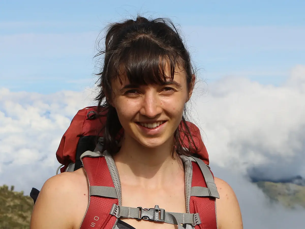 Portrait shot of Muriel Racky smiling into the camera.