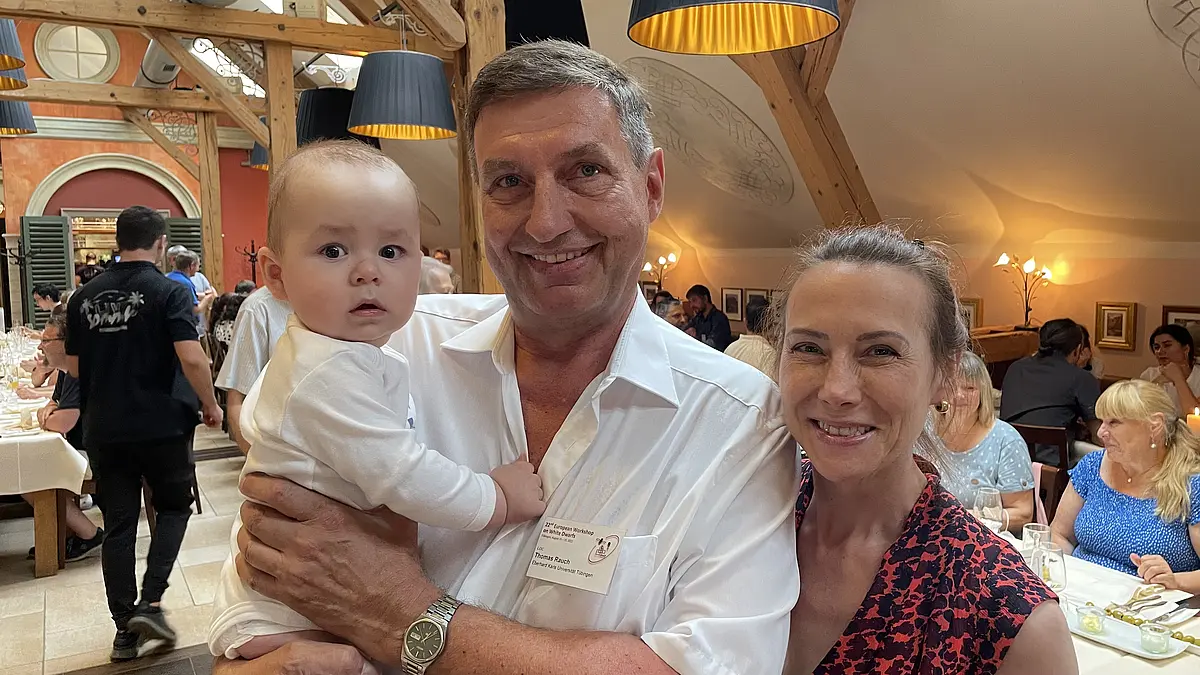 Benjamin, the youngest participant, at the conference dinner, Aug 17, 6:37 pm