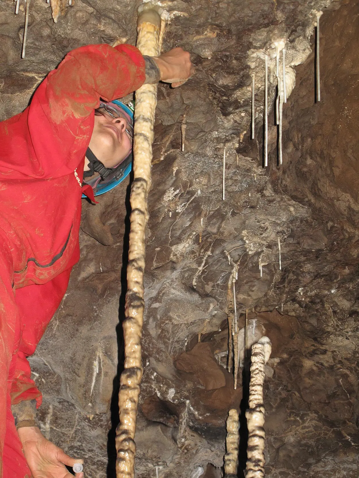 Professor Kira Rehfeld takes samples in a dripstone cave.