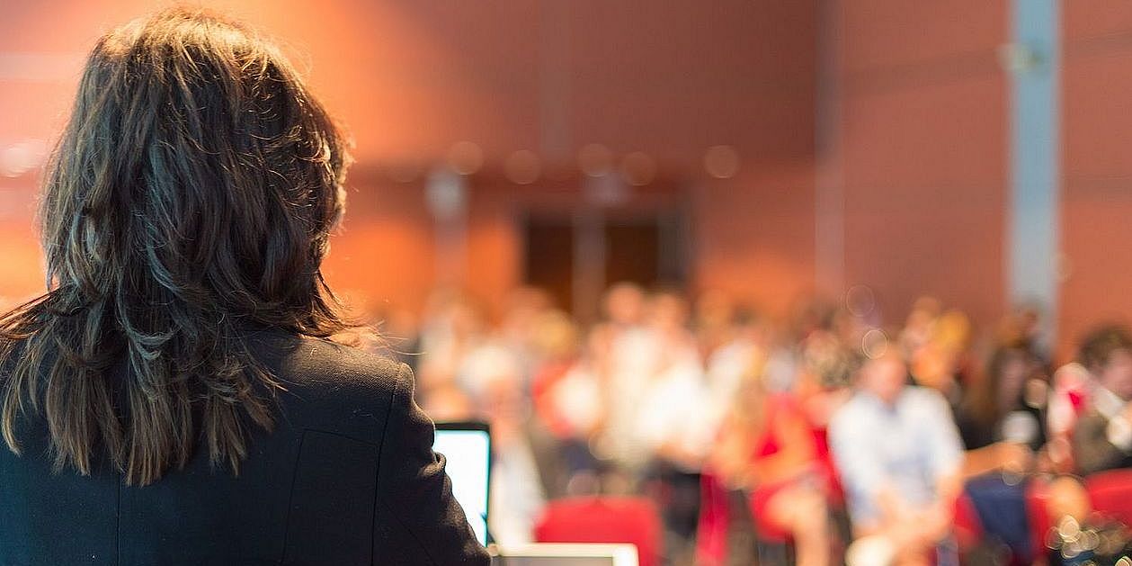 Speaker in front of an audience